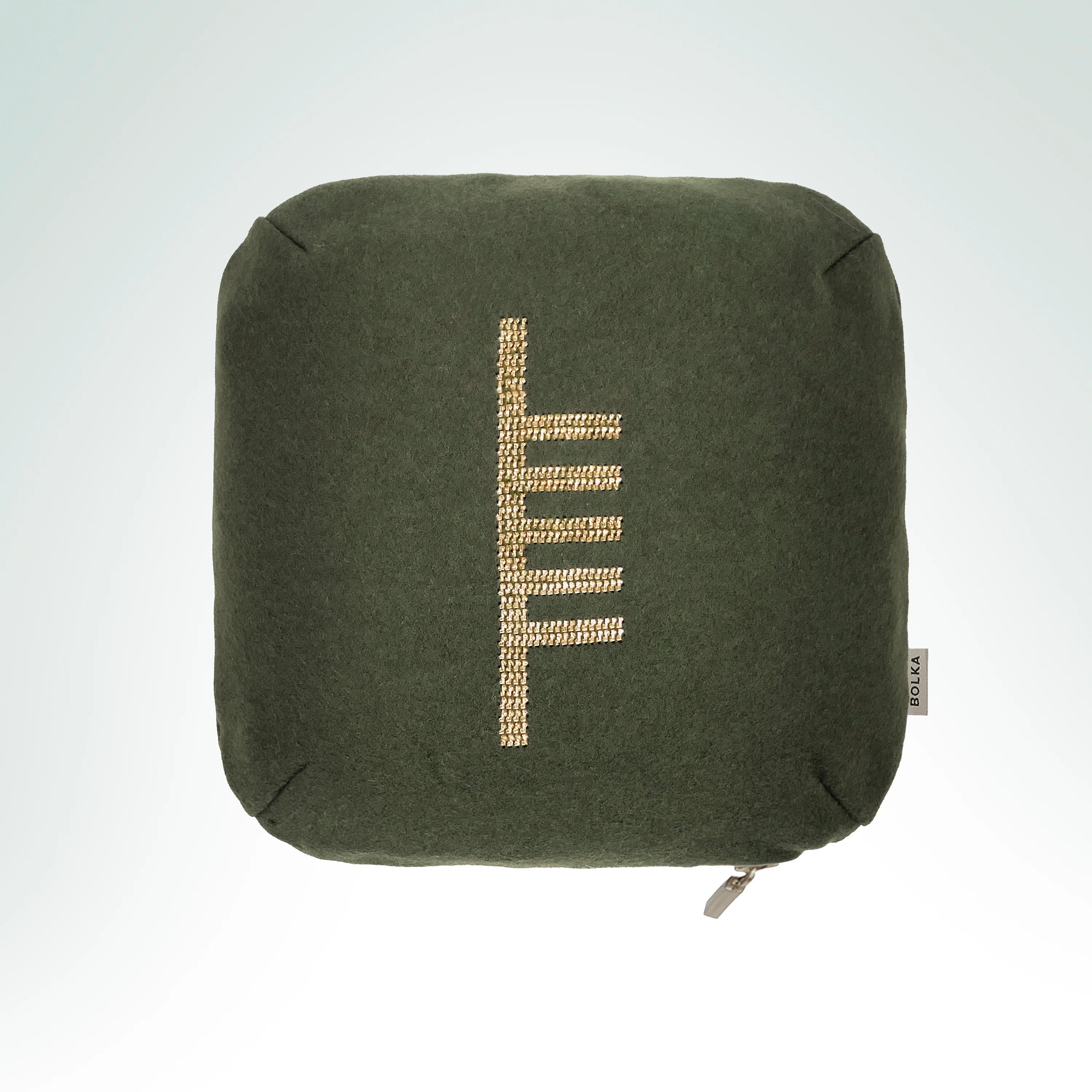 Hand-embroidered heritage wool cushion featuring the Ash Tree of Life Ogham symbol with gold metal thread embroidery.