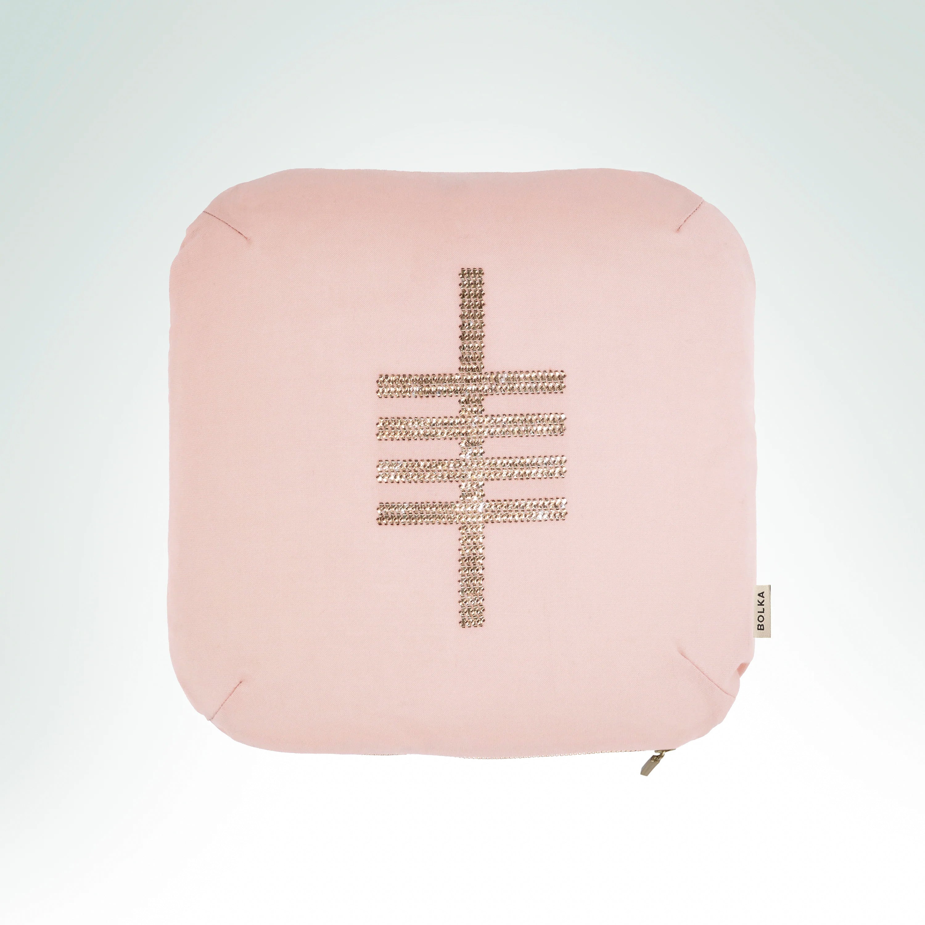 Hand-embroidered heritage wool pink cushion featuring the Aspen Ogham symbol with gold metal thread embroidery