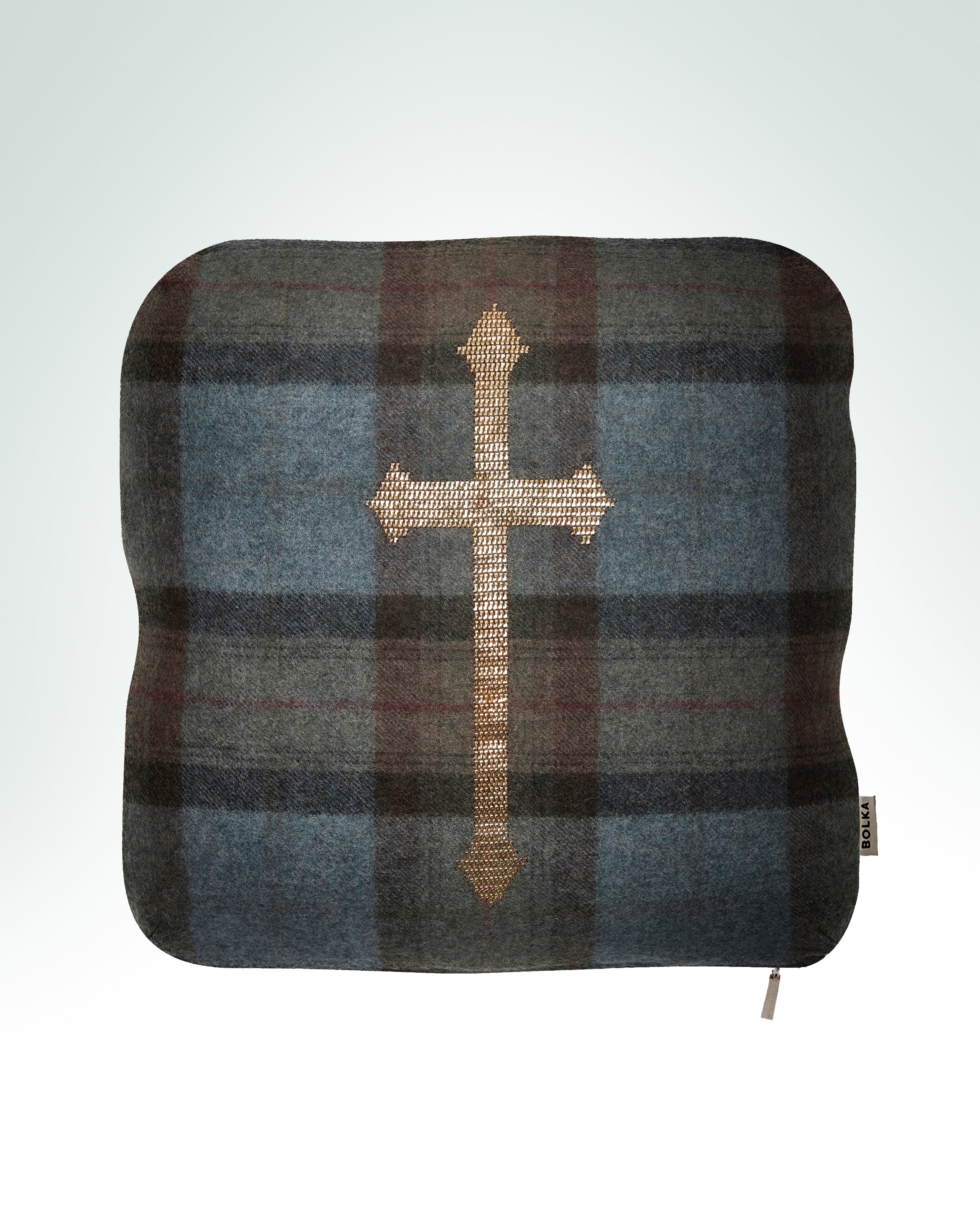 Cross hand-embroidered on blue tartan wool cushion with gold metal thread.