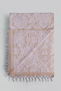 Carnation jacquard Turkish cotton bath towel in saffron yellow inspired by Ottoman floral motifs.