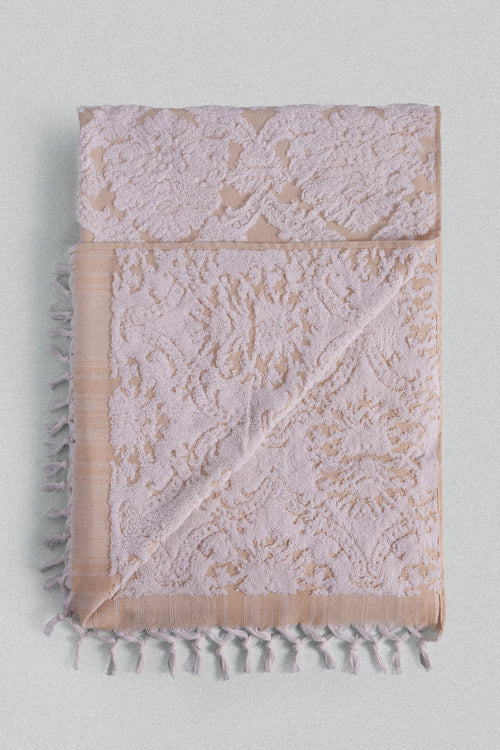 Carnation jacquard Turkish cotton bath towel in saffron yellow inspired by Ottoman floral motifs.