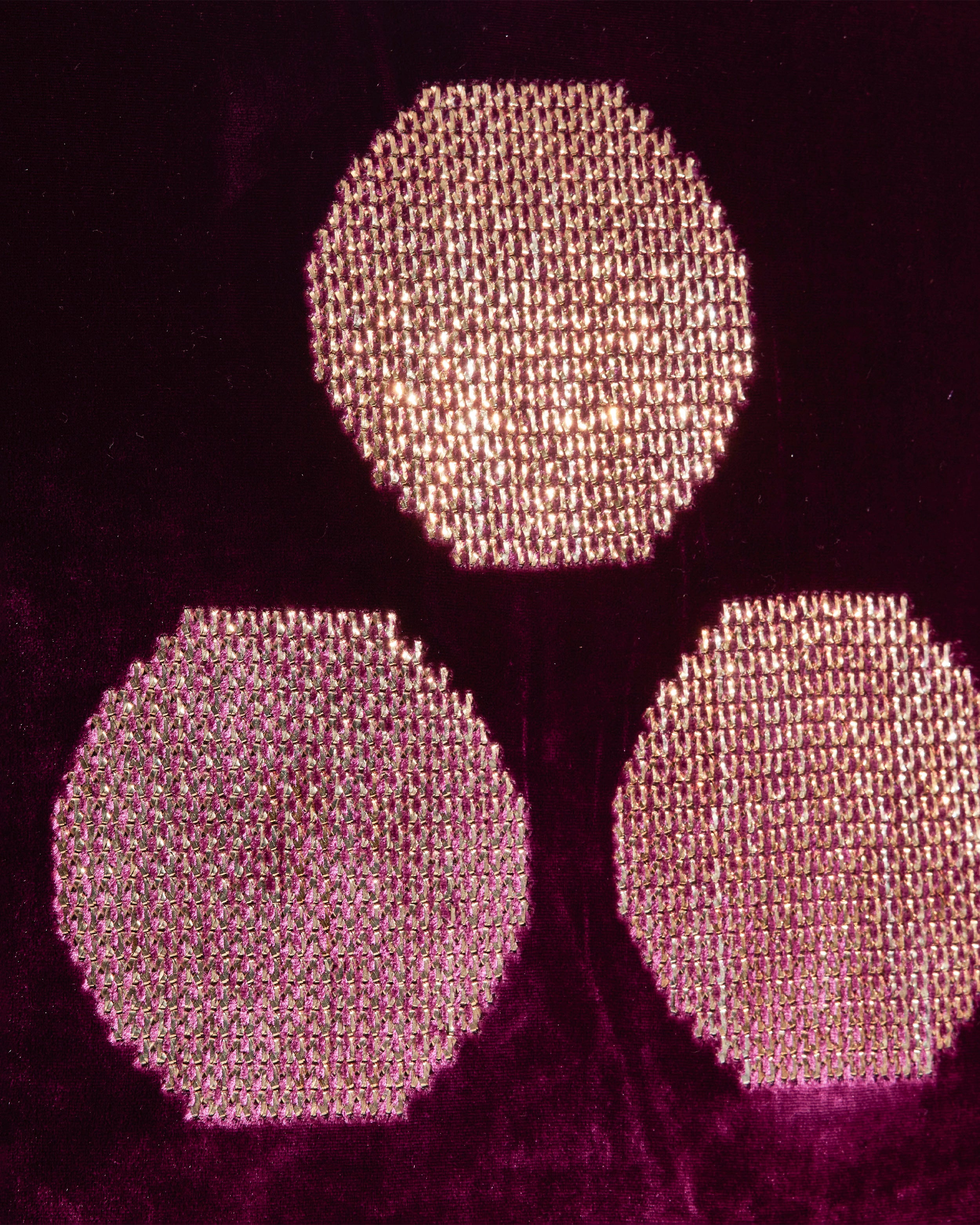 Close-up of gold metallic Chintamani embroidery on Golden Berry silk-blend velvet cushion