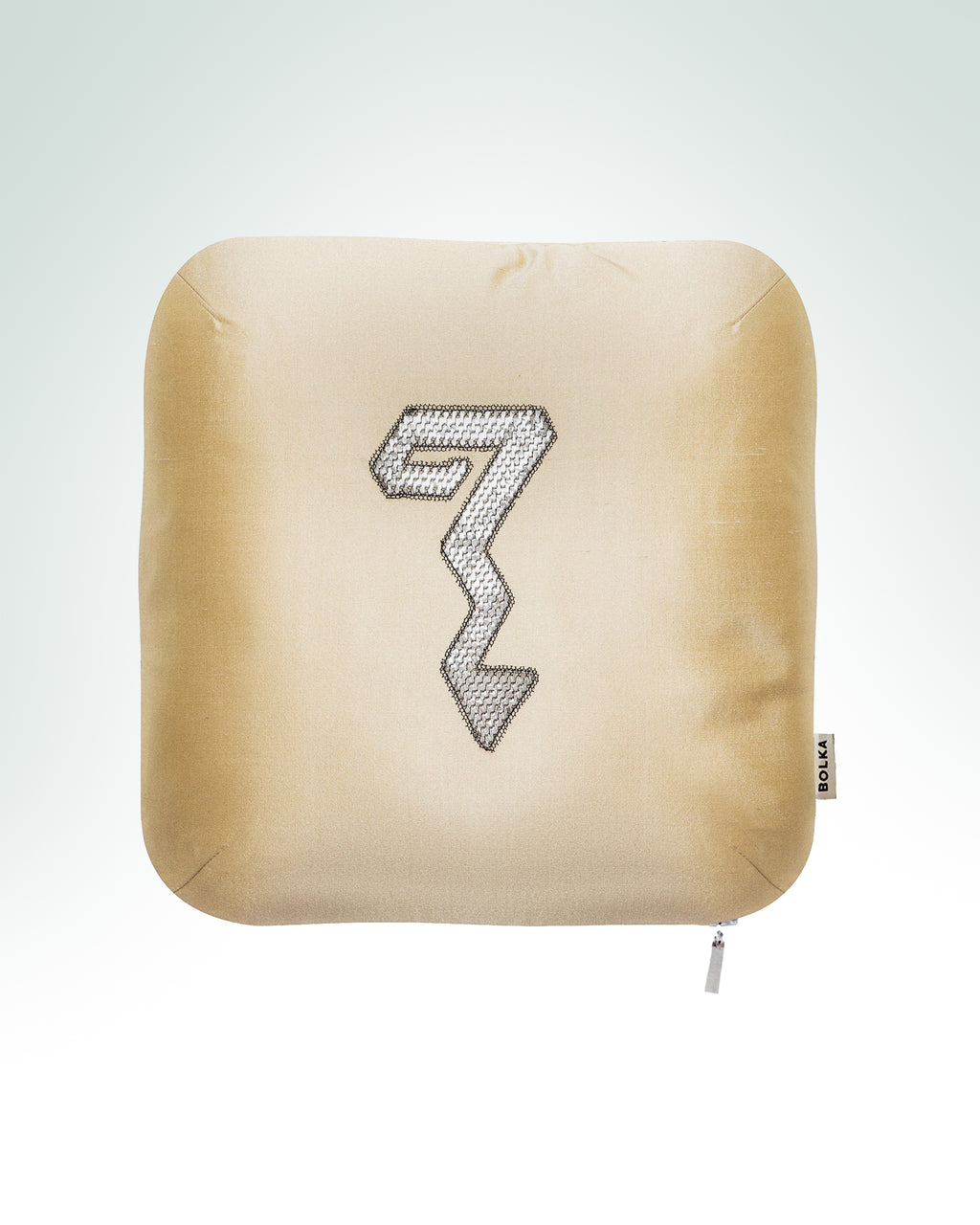 Serpent hand-embroidered pale yellow silk cushion with silver metal thread embroidery.