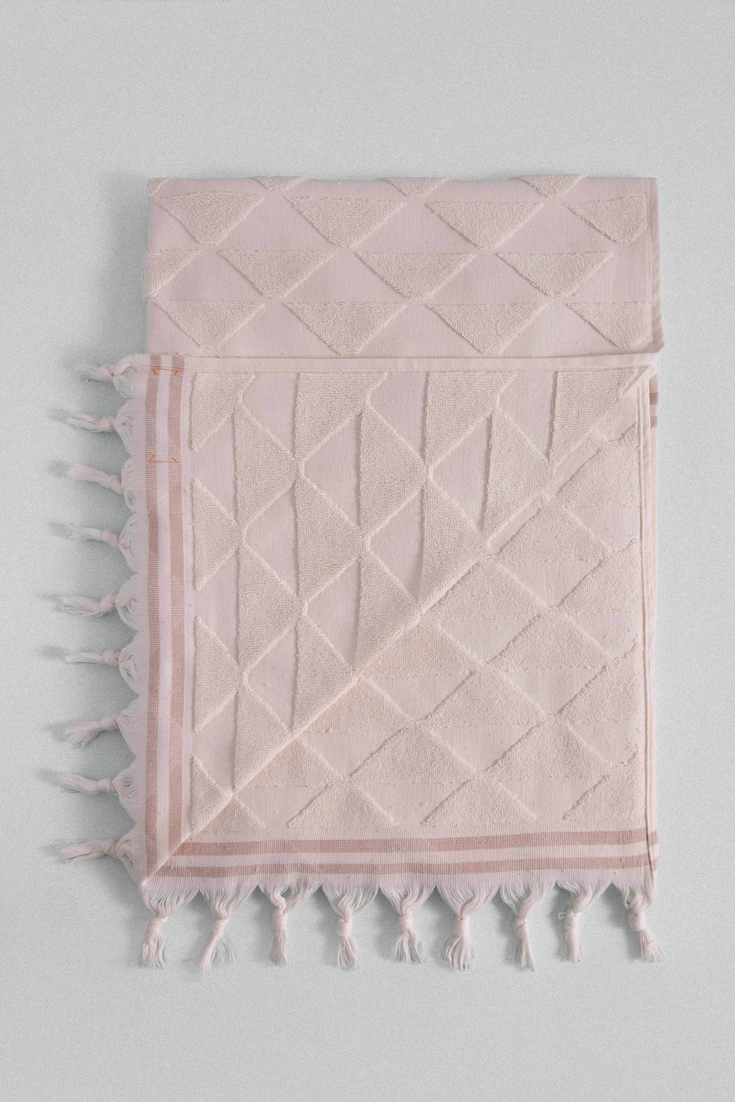 Striped triangle motif beige Turkish bath towel. 