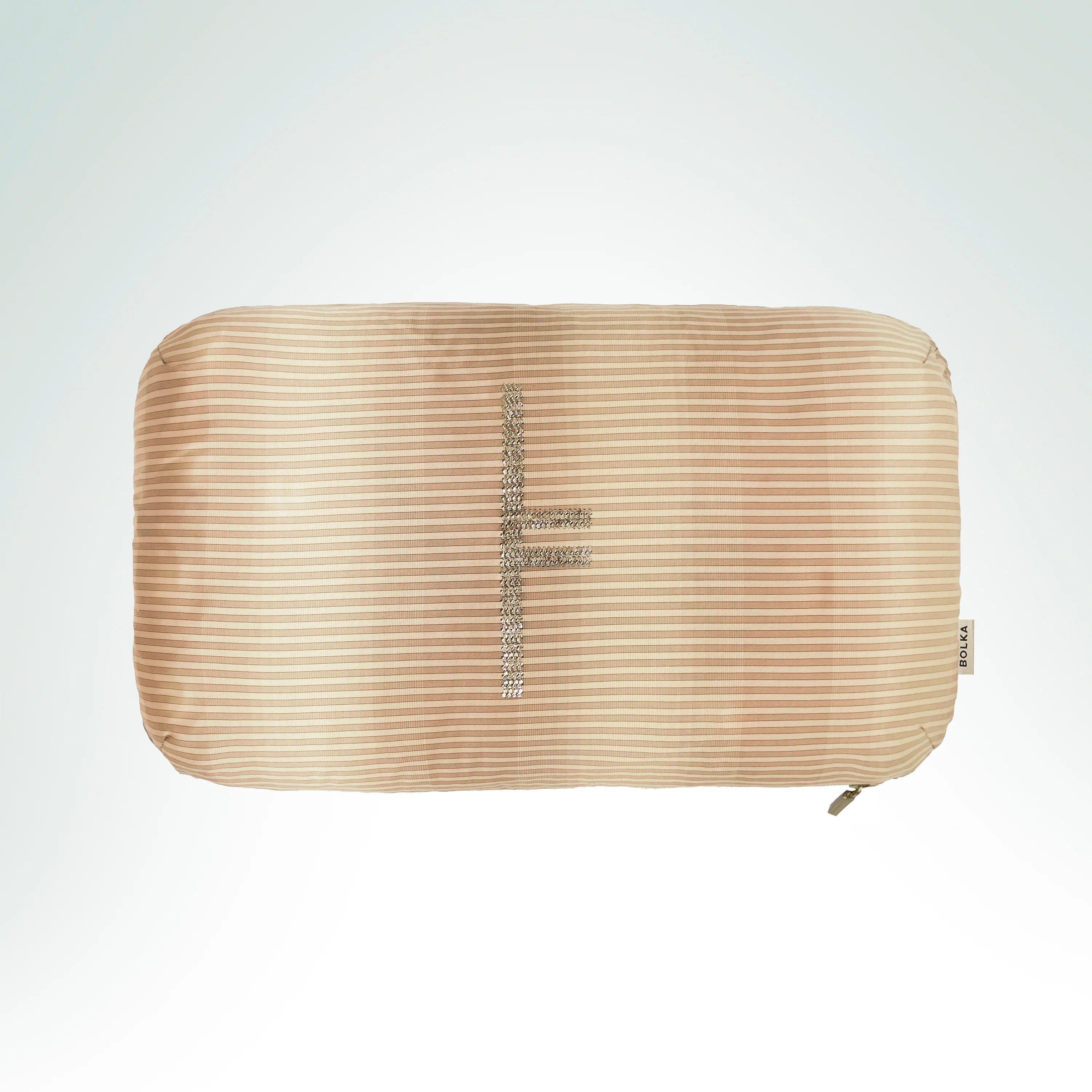Hand-embroidered hand-loomed silk cushion tonal-striped in beige featuring the Rowan Ogham symbol with silver metal thread.
