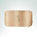 Hand-embroidered hand-loomed beige silk cushion featuring the Vine Ogham symbol with silver metal thread embroidery.