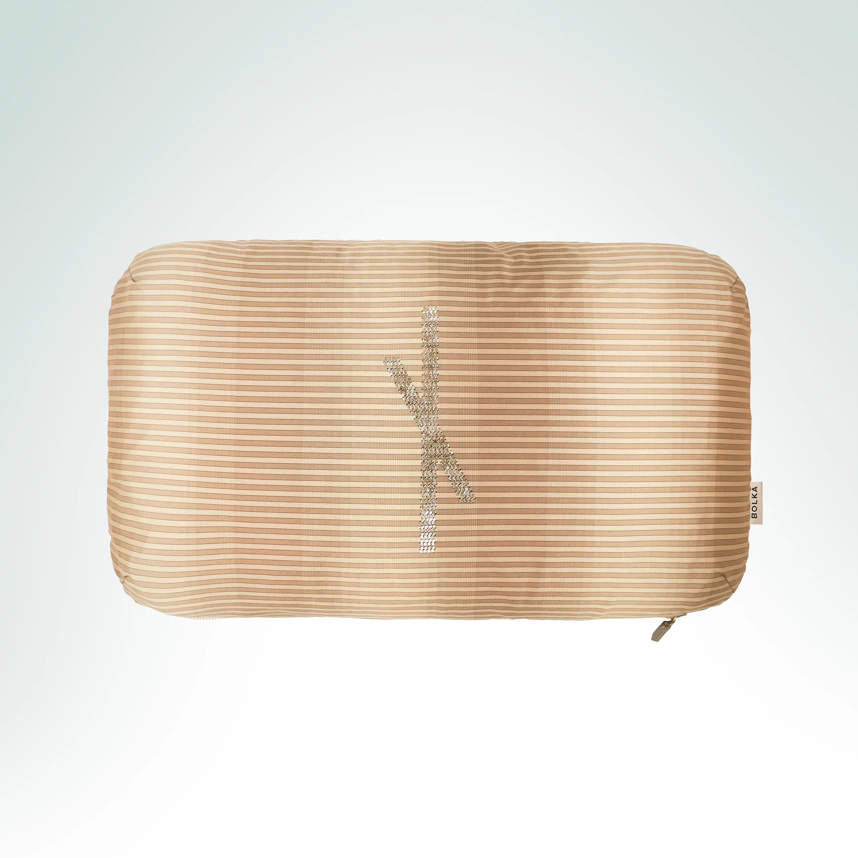Hand-embroidered hand-loomed beige silk cushion featuring the Vine Ogham symbol with silver metal thread embroidery.