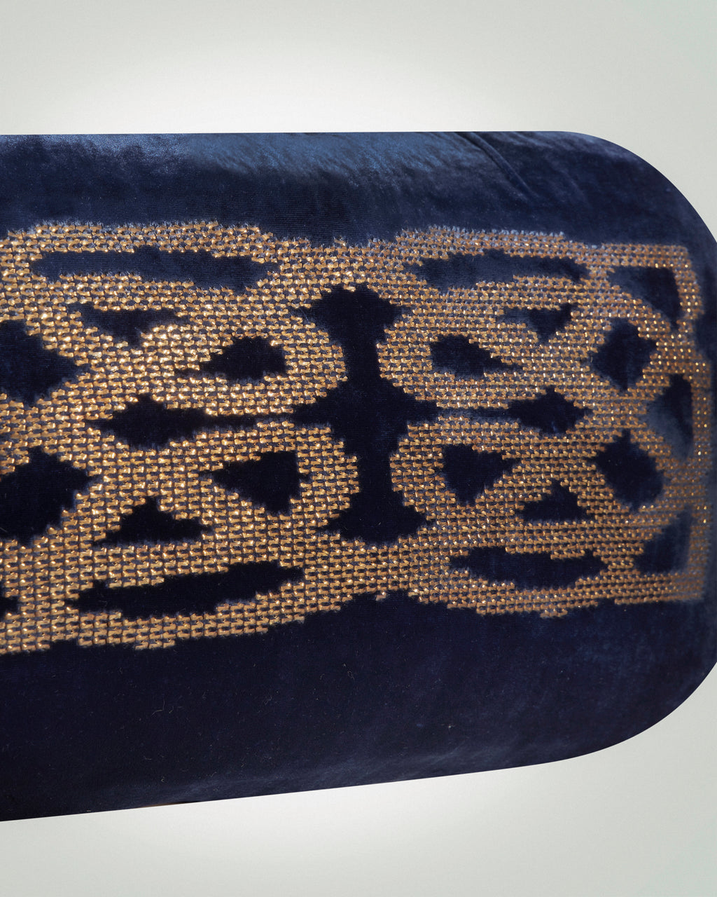 celtic knot hand-embroidered cushion on night blue velvet cushion with gold thread.