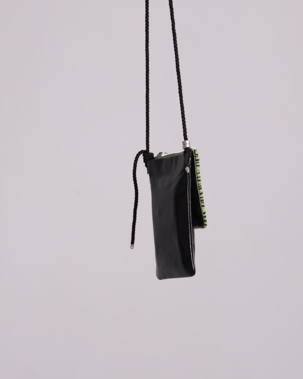 Comb hand-embroidered crossbody leather phone pouch for essentials.