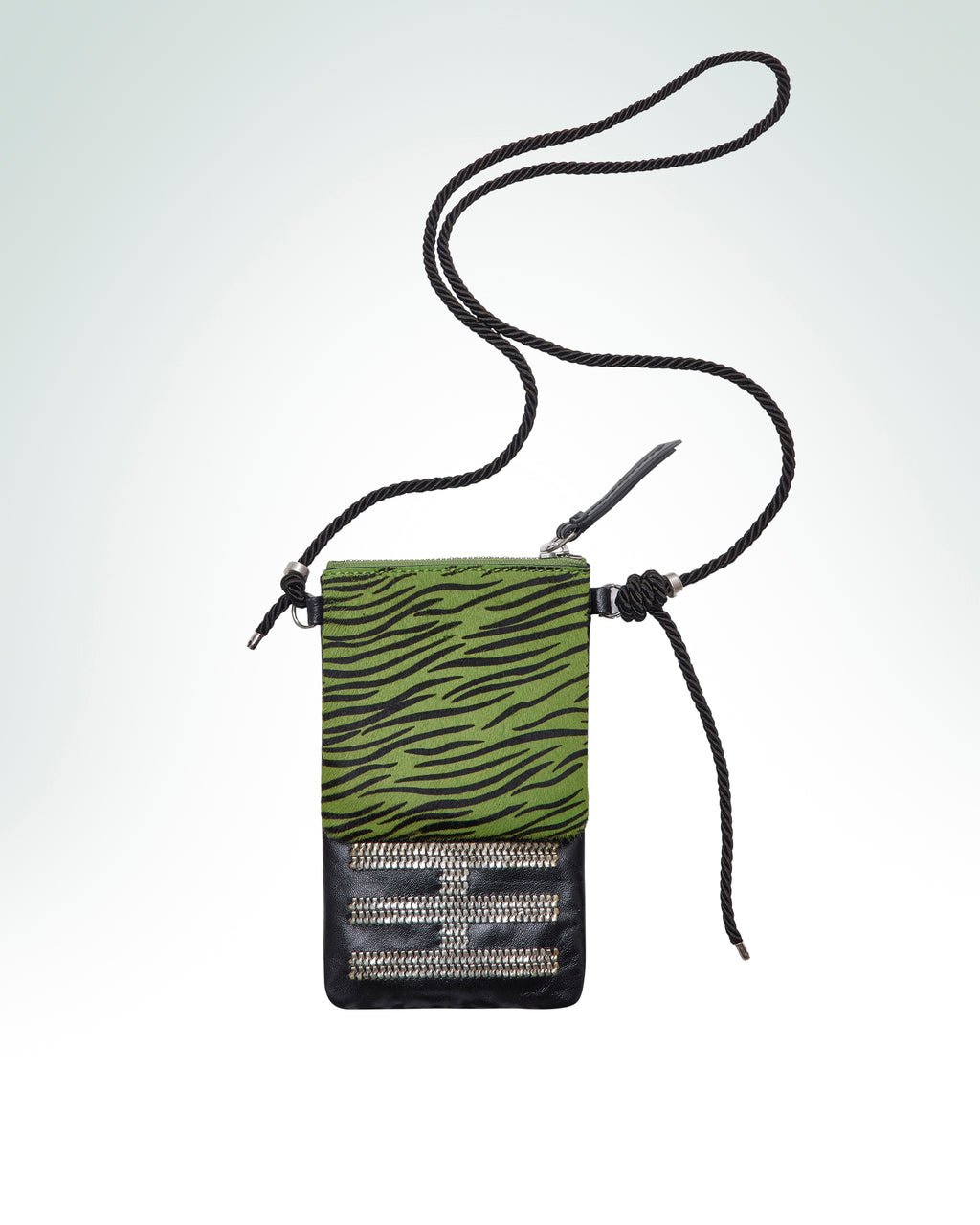 Leather crossbody phone pouch with a zebra-print pistachio pocket and a shiny black leather body.